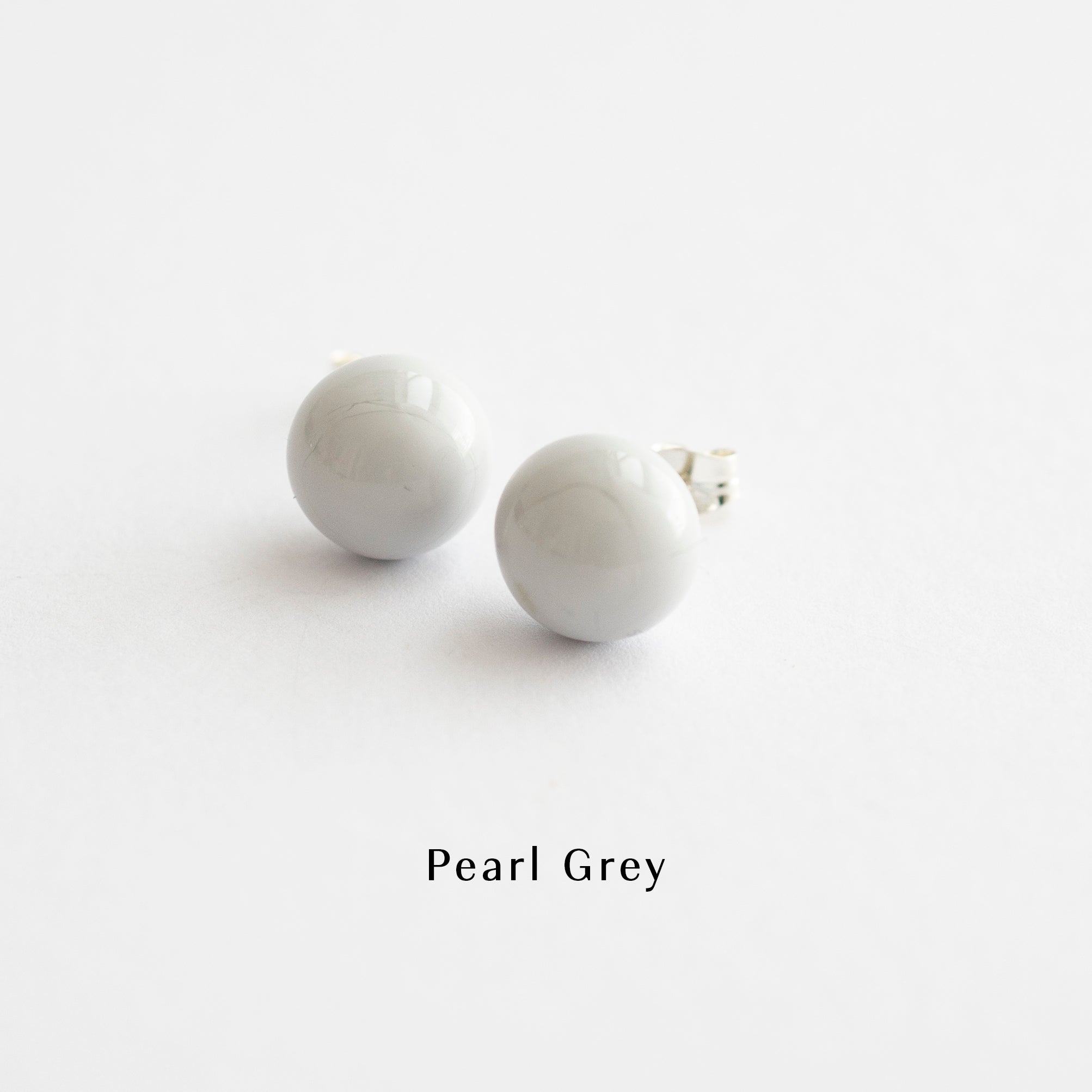 Pompom korvakoru pearl grey helmen harmaa